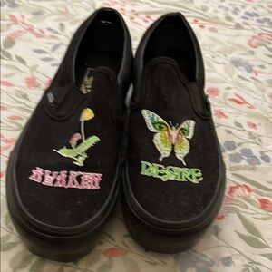 Vans Black Slip-Ons with Vibrant Graphics